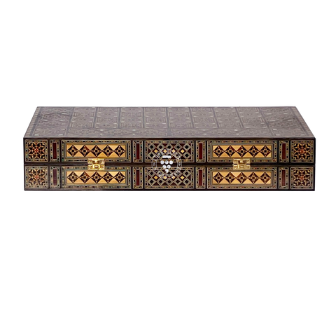 Side view of the closed Damascus Rose wooden backgammon case, showing its compact size
