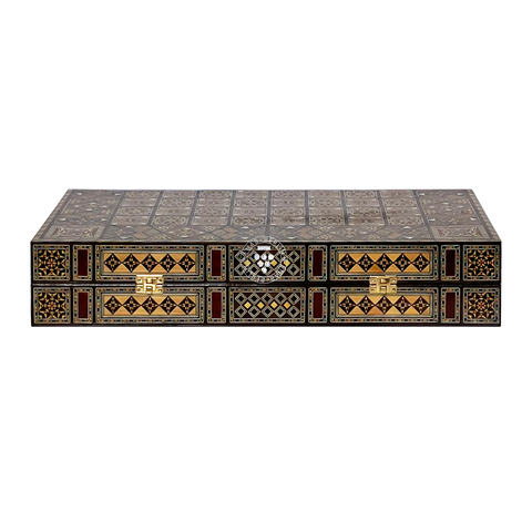 Side view of the closed Old Damascus wooden backgammon case, showing its compact size