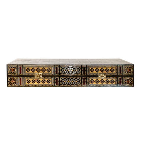 Side view of the closed Star of Damascus wooden backgammon case, showing its compact size