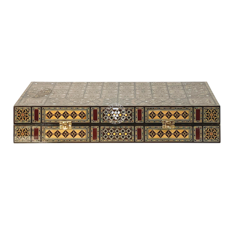 Side view of the closed Umayyad wooden backgammon case, showing its compact size